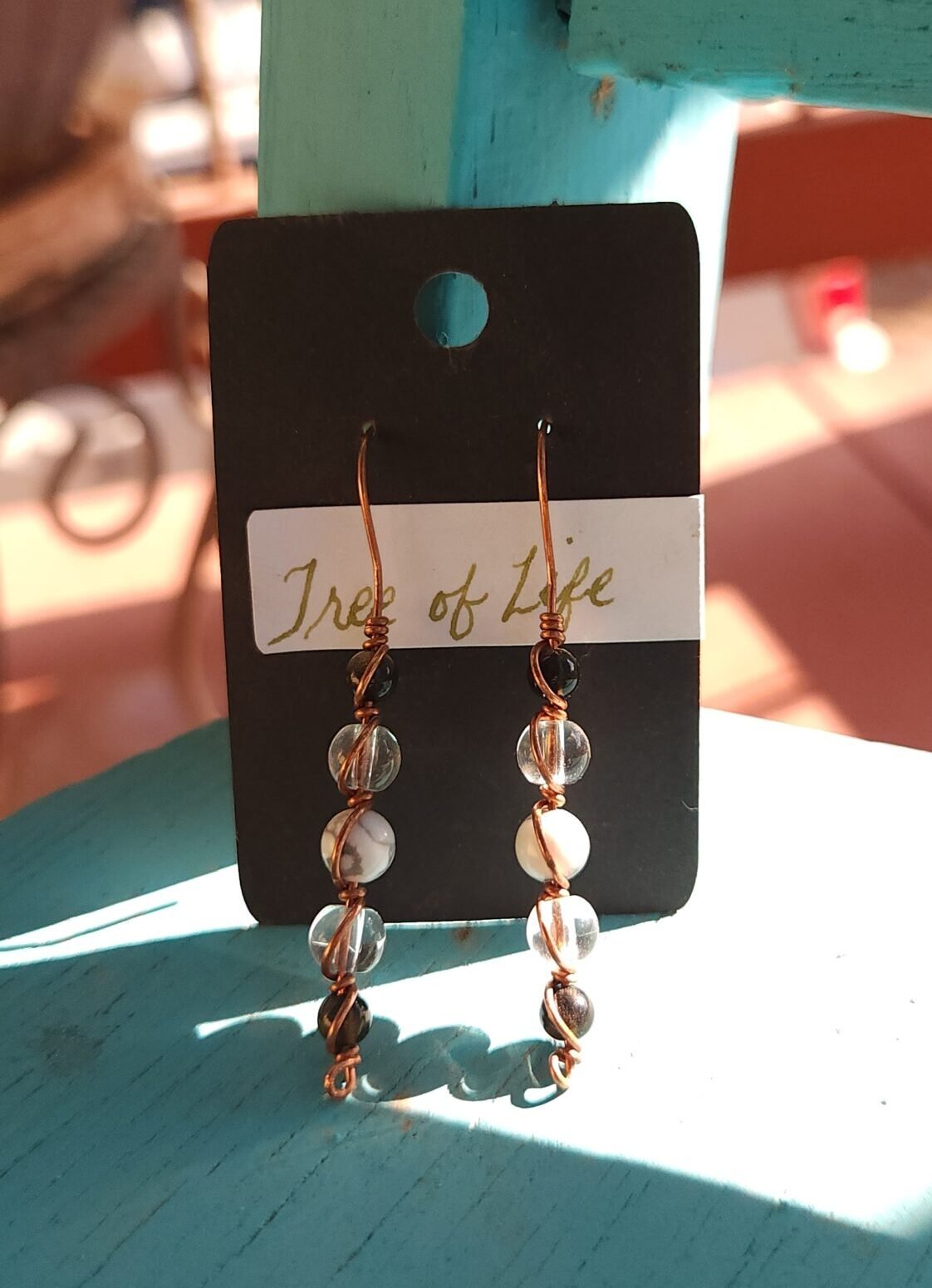 Copper wrapped earrings with gold sheen quartz, clear quartz, and howlite beads